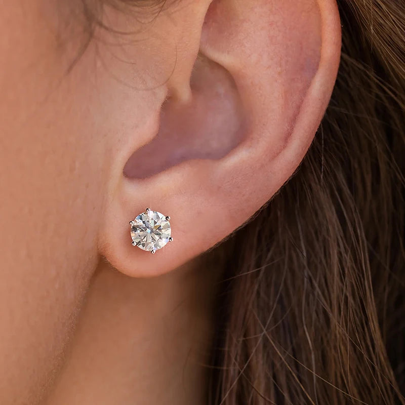 Round moissanite stud earrings in silver setting — SARAB Jewelry — detail 4